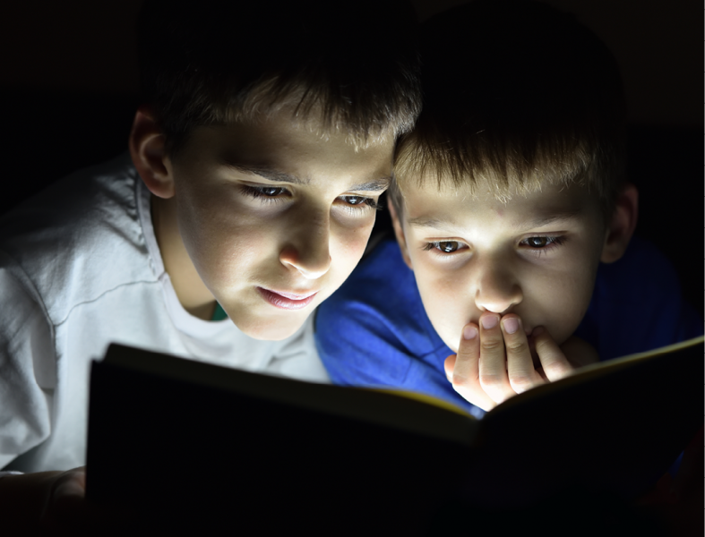 Boys Reading by Flashlight.png